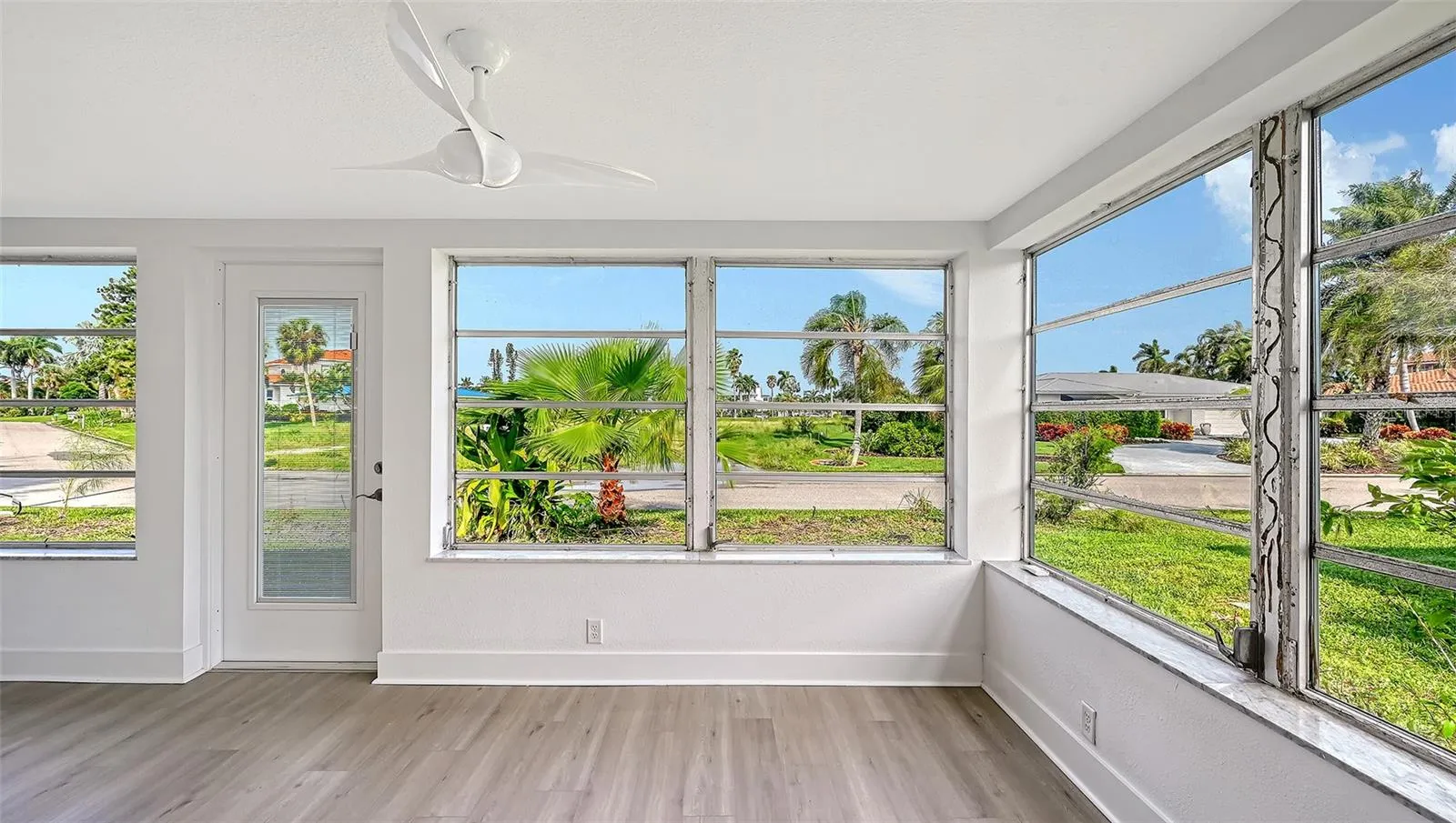 Lanai with doorway to the rear yard.