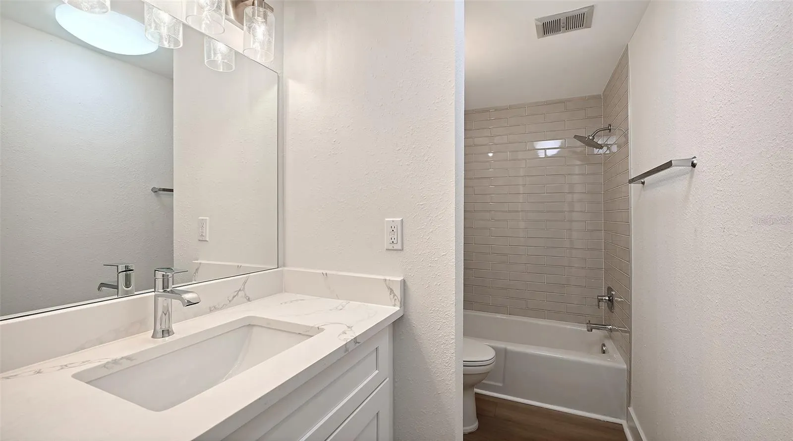Guest Bathroom with tub/shower combination.