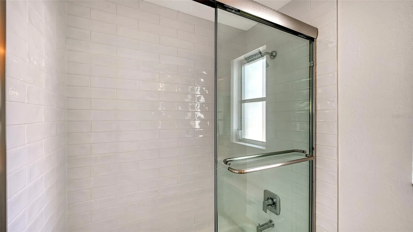 Primary bathroom with tub/shower combo.