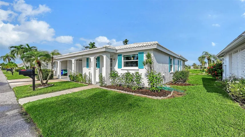 This villa is attached at the carports and is an end unit.