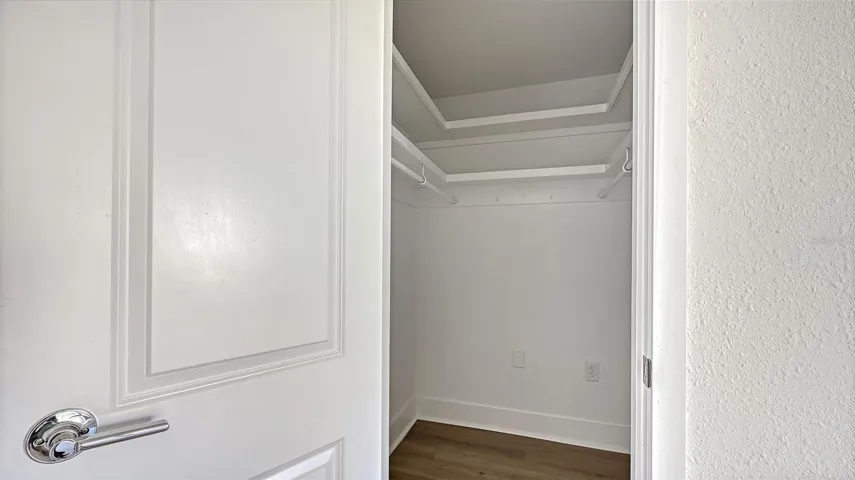 Primary Bedroom (bedroom one) walk-in closet.