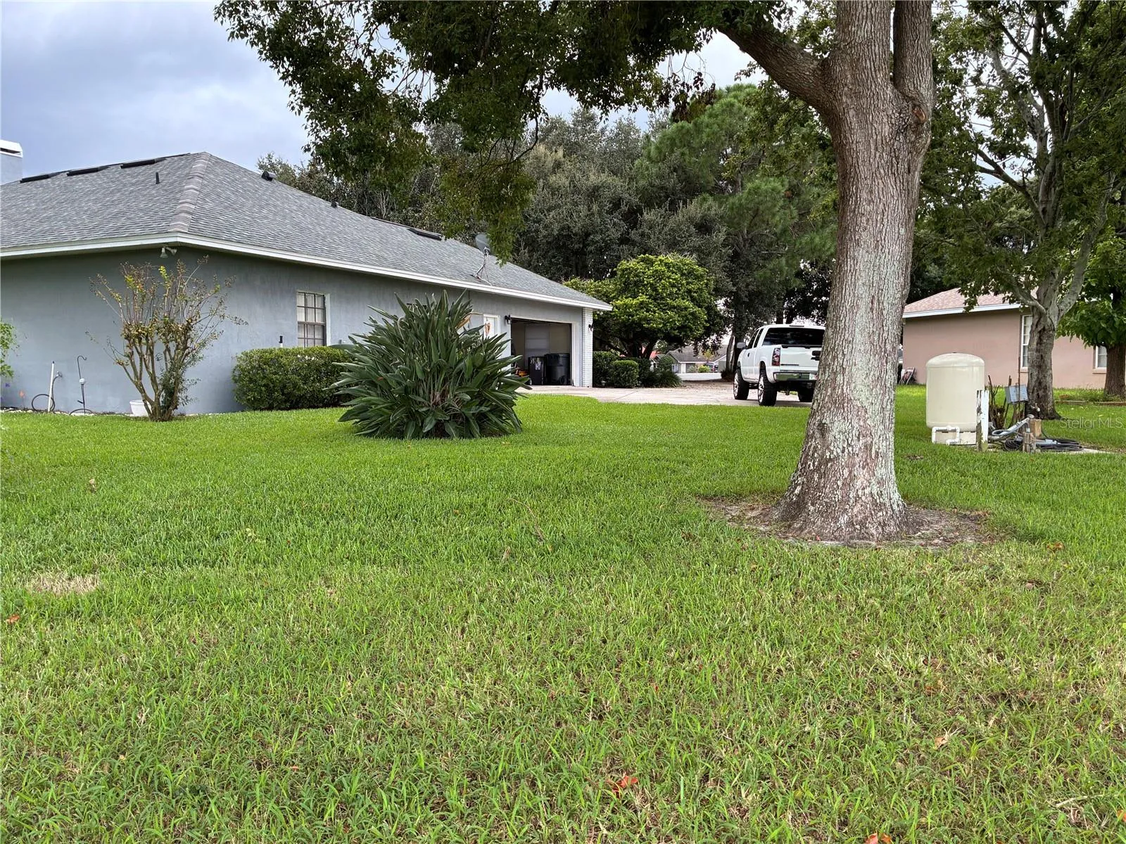 GARAGE SIDE VIEW OF YARD