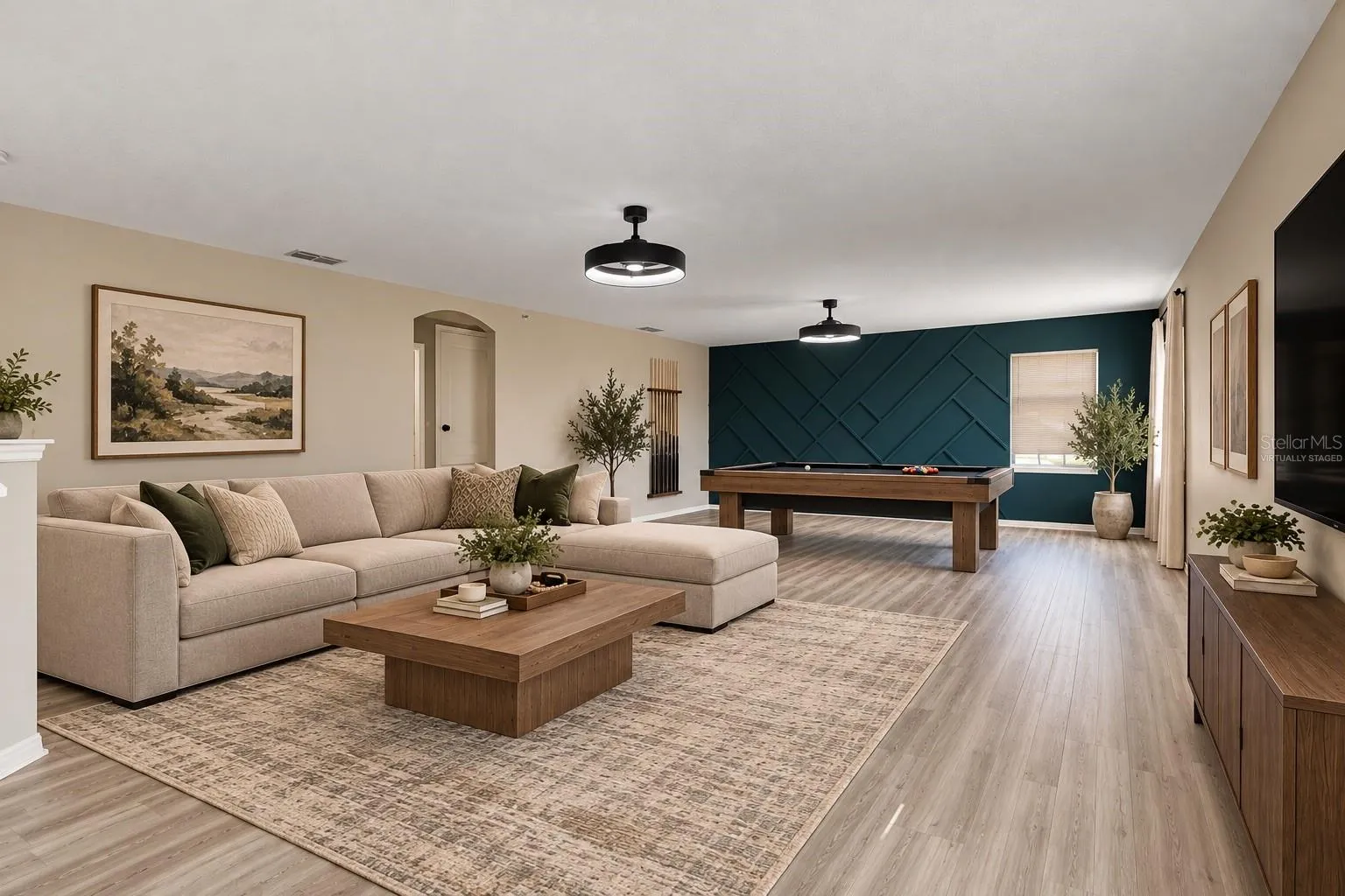 Upstairs, a HUGE LOFT with UPDATED LIGHT/FAN FIXTURES and an accent wall, provides valuable flex space for a media room, game room, home office or additional lounge area. Virtually Staged
