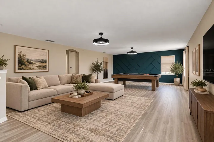 Upstairs, a HUGE LOFT with UPDATED LIGHT/FAN FIXTURES and an accent wall, provides valuable flex space for a media room, game room, home office or additional lounge area. Virtually Staged