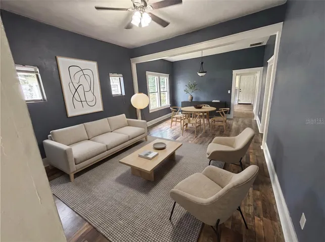 Living/dining room looking toward rear of house "Virtually staged"