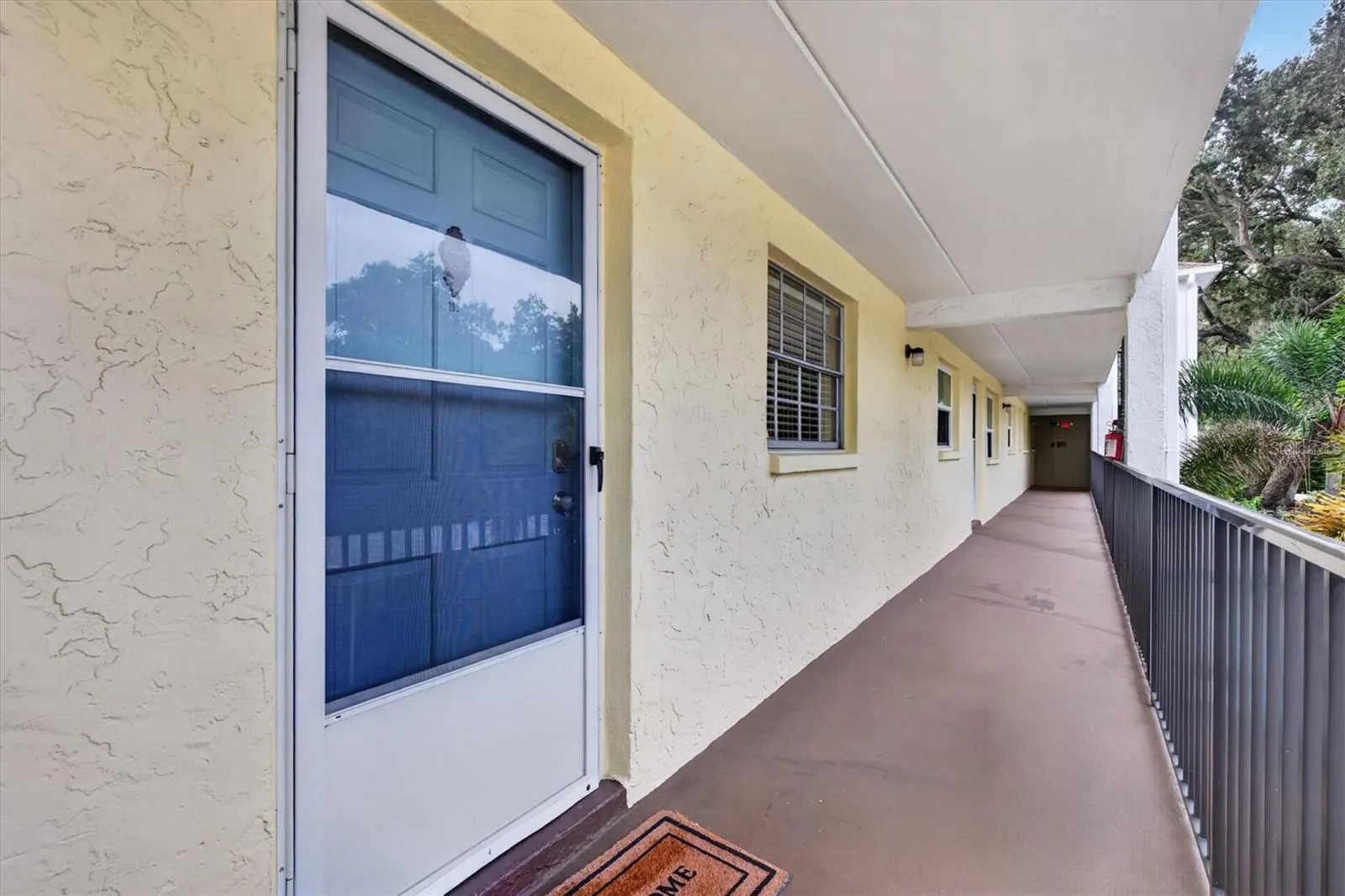 2nd Floor entry with screened storm door.