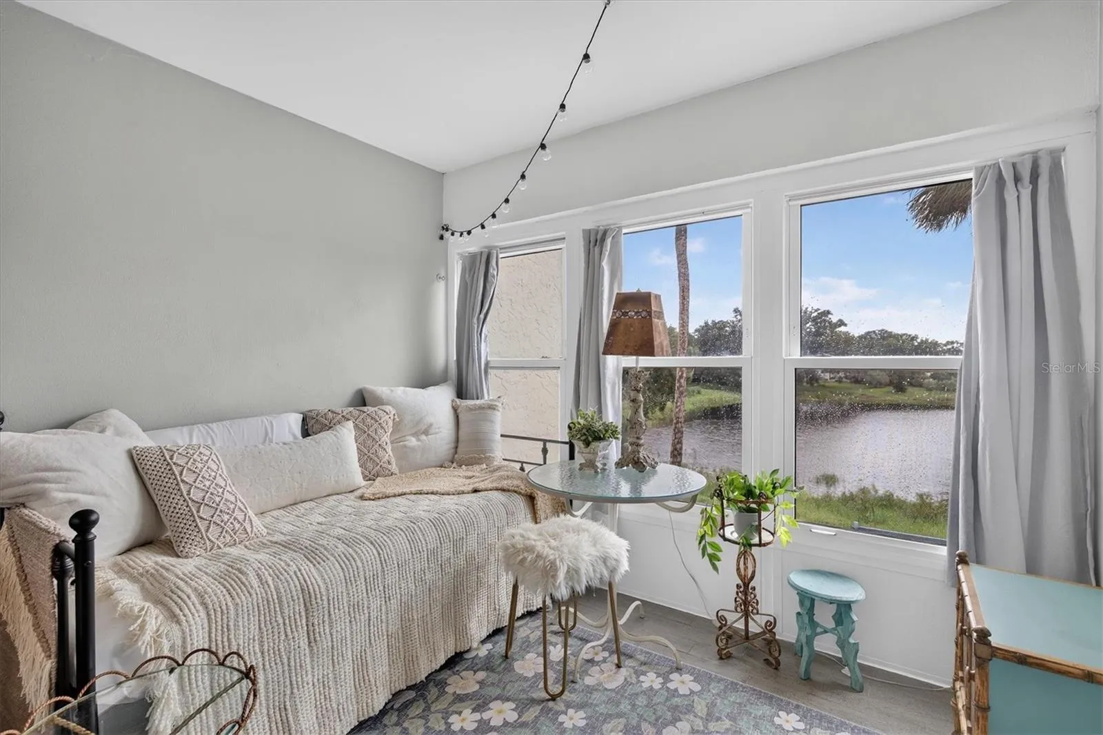 Florida room overlooks gorgeous pond with abundant wildlife.