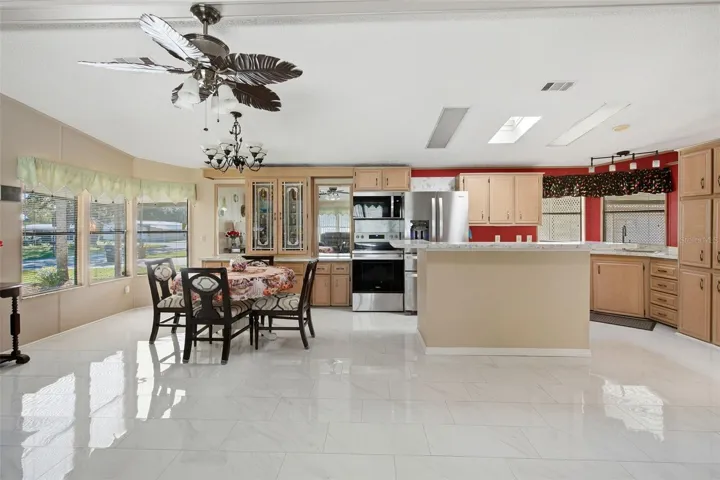 Virtually enhanced image depicting the anticipated finished appearance of the kitchen island. Island finishing work is pending completion.