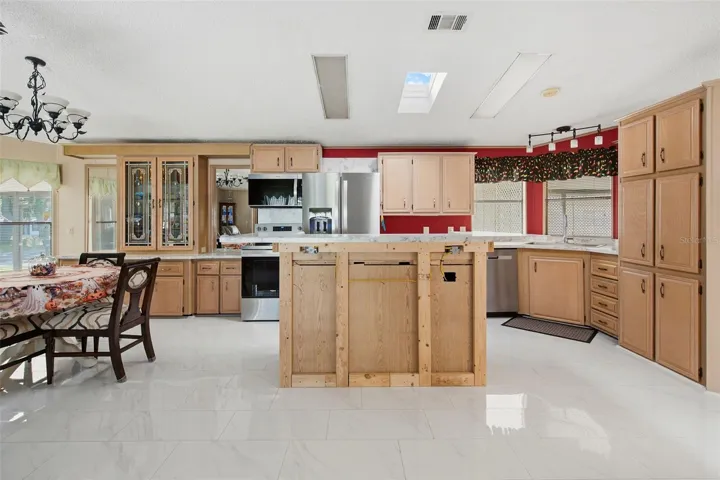 Current condition of kitchen island. Finishing work is scheduled to be completed.