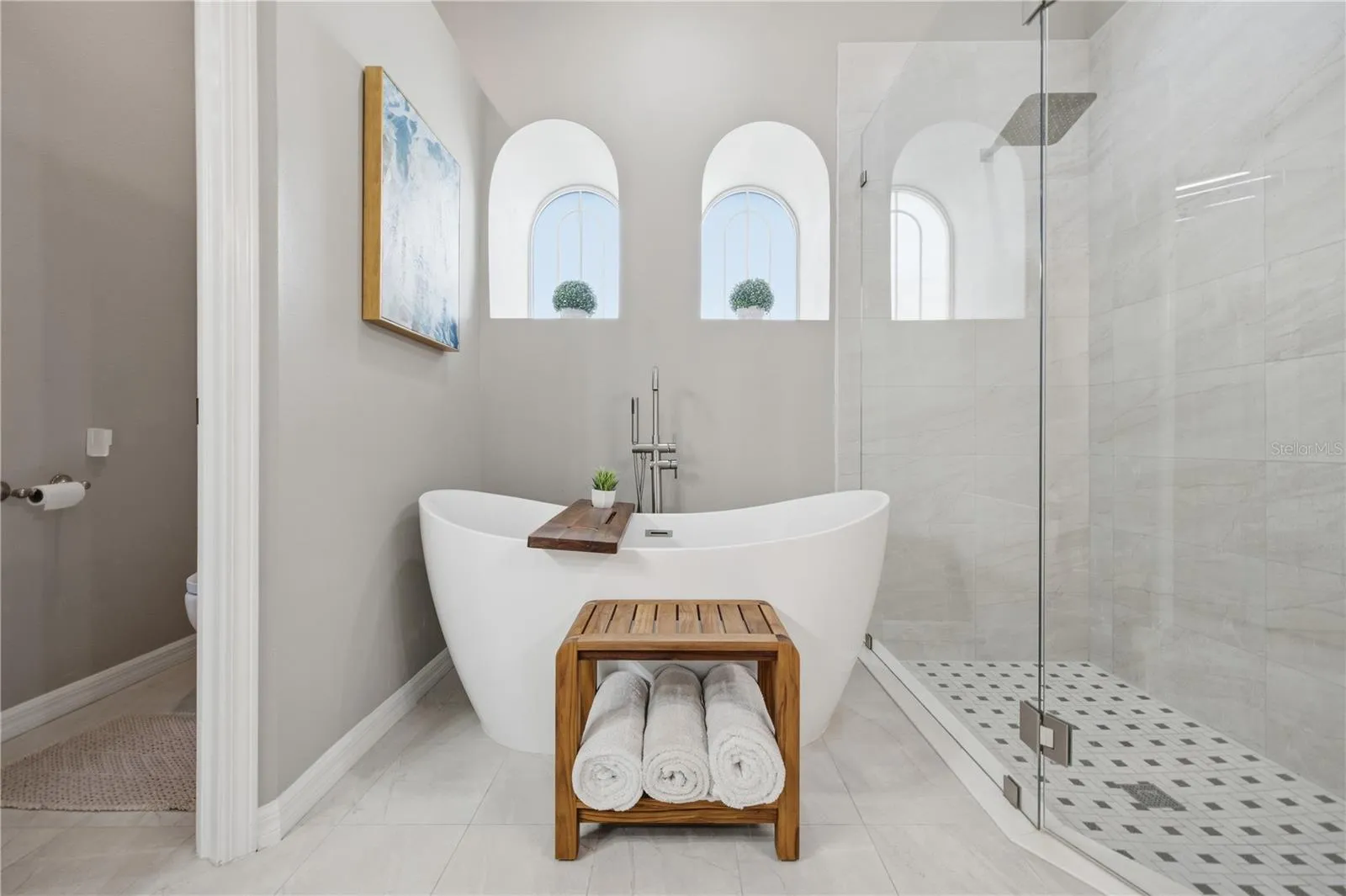 Freestanding Soaking Tub in updated master bath.