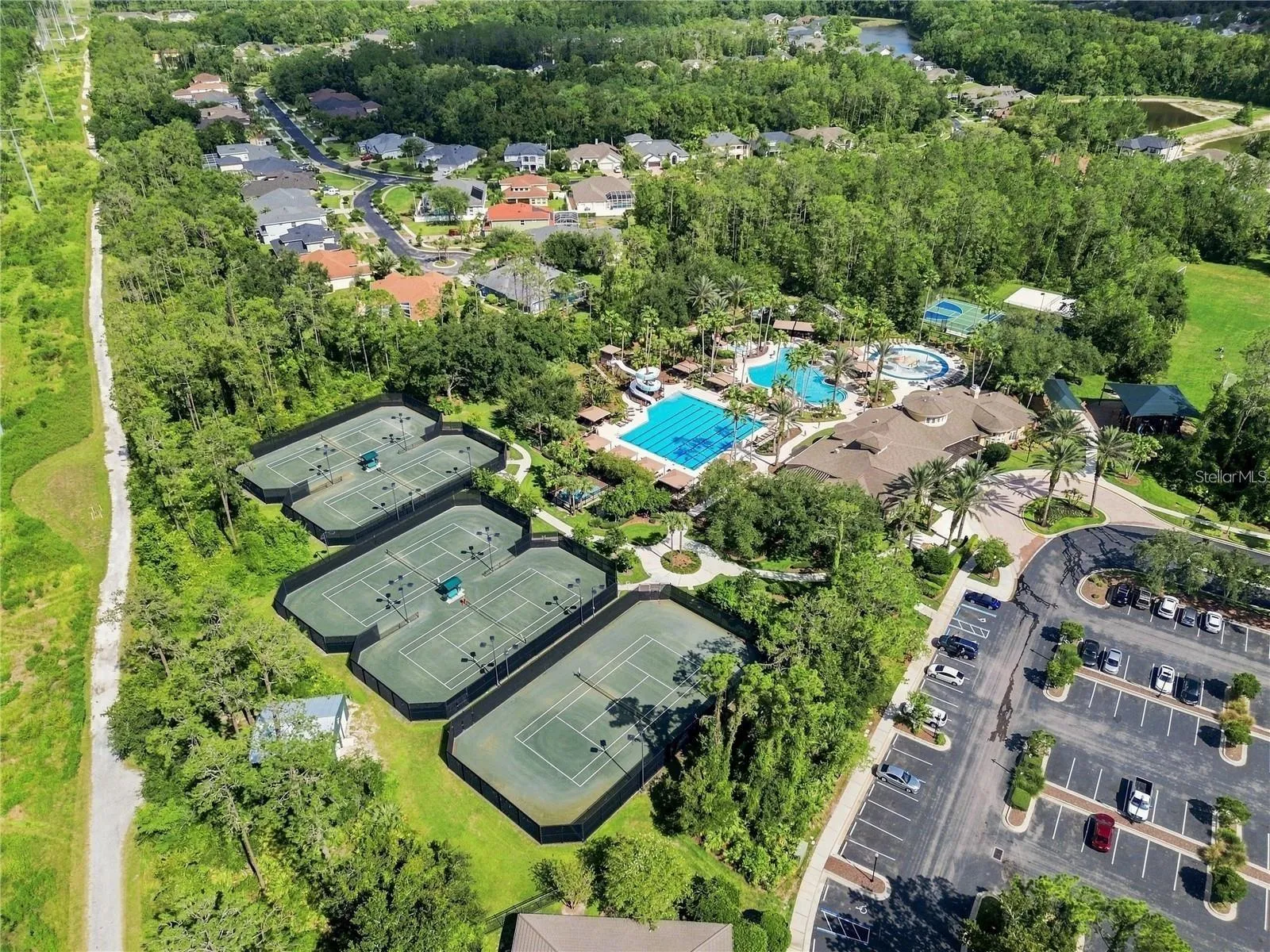 Seven Oaks is a premier master-planned community comprising nearly 30 pocket neighborhoods of single-family homes and townhomes, anchored by the signature 17-acre Sports Club with resort-class amenities. The CDD was established in January 2001, and homes were built from 2002 through 2018 by multiple national builders. With approximately 4,200 residents, it is one of Wesley Chapel's largest and most established communities.