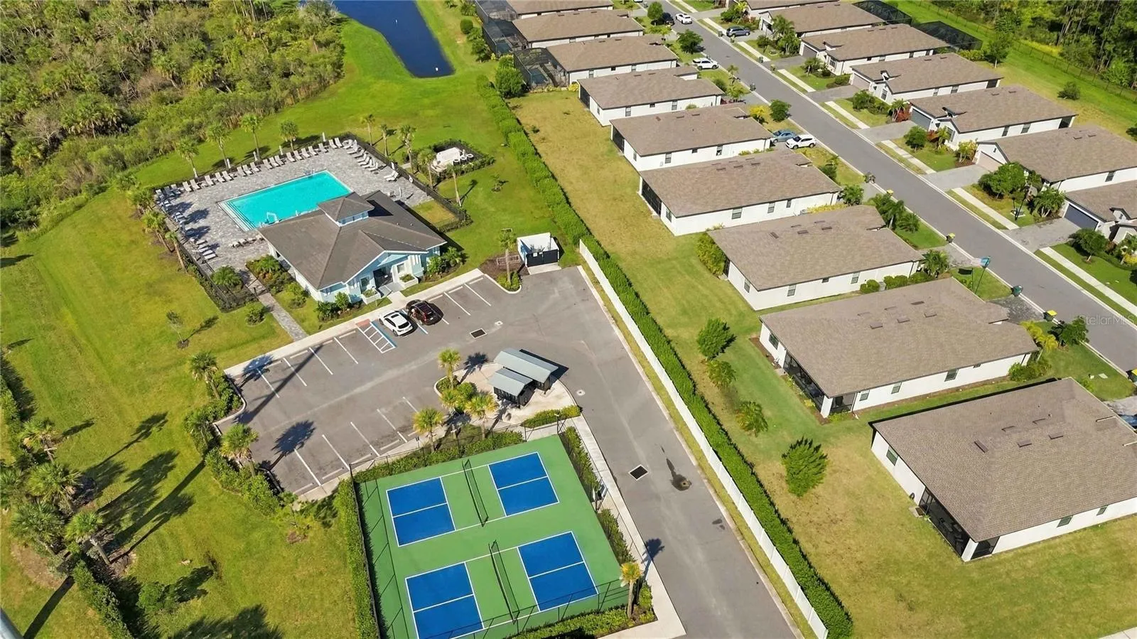 Gated community includes heated pool, pickleball, fitness center, cable tv and internet included.