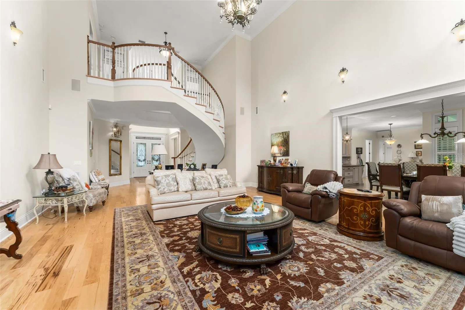 Family room looking back towards foyer &amp; floating staircase