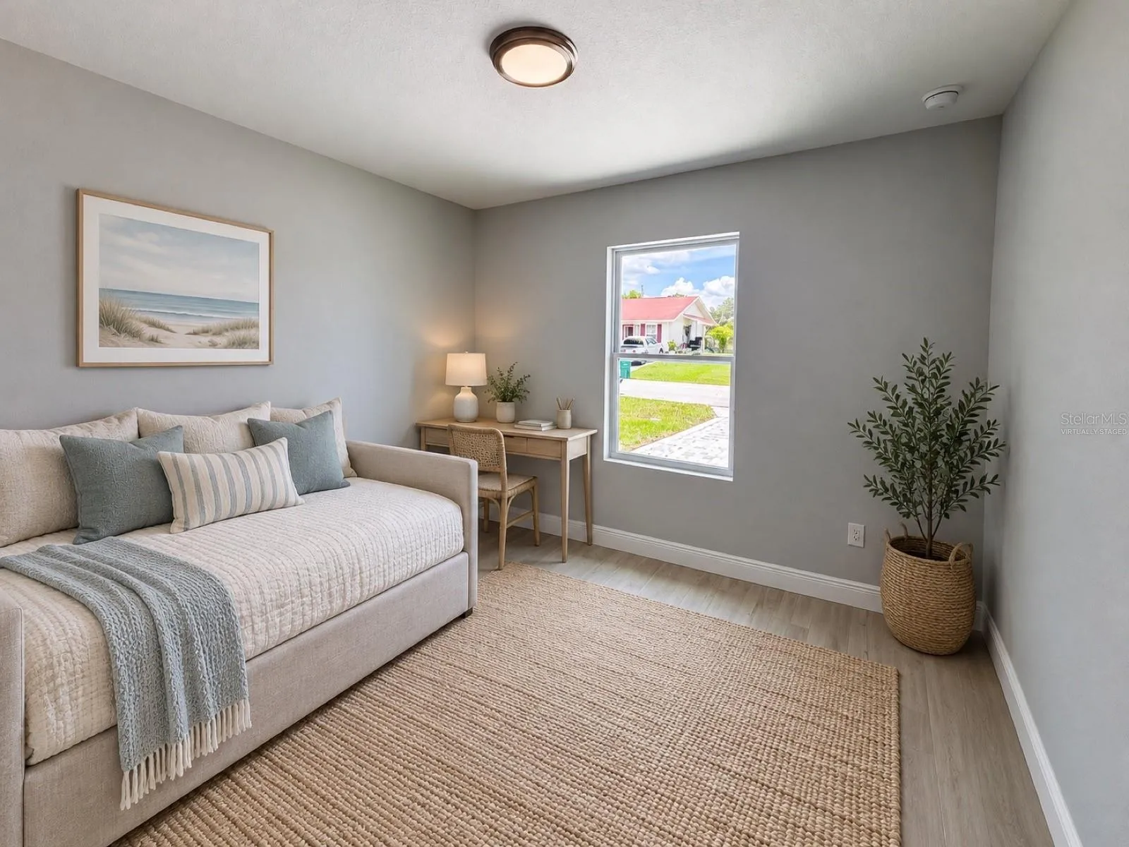 Virtually staged bedroom; furniture and decor are digitally added.