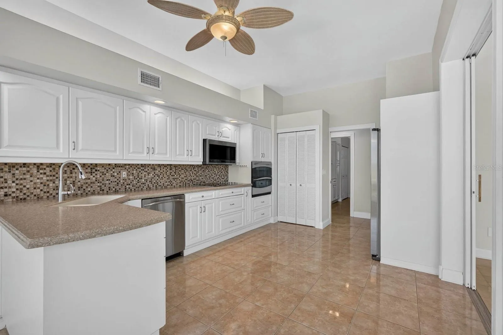 Bright Kitchen With Cabinetry