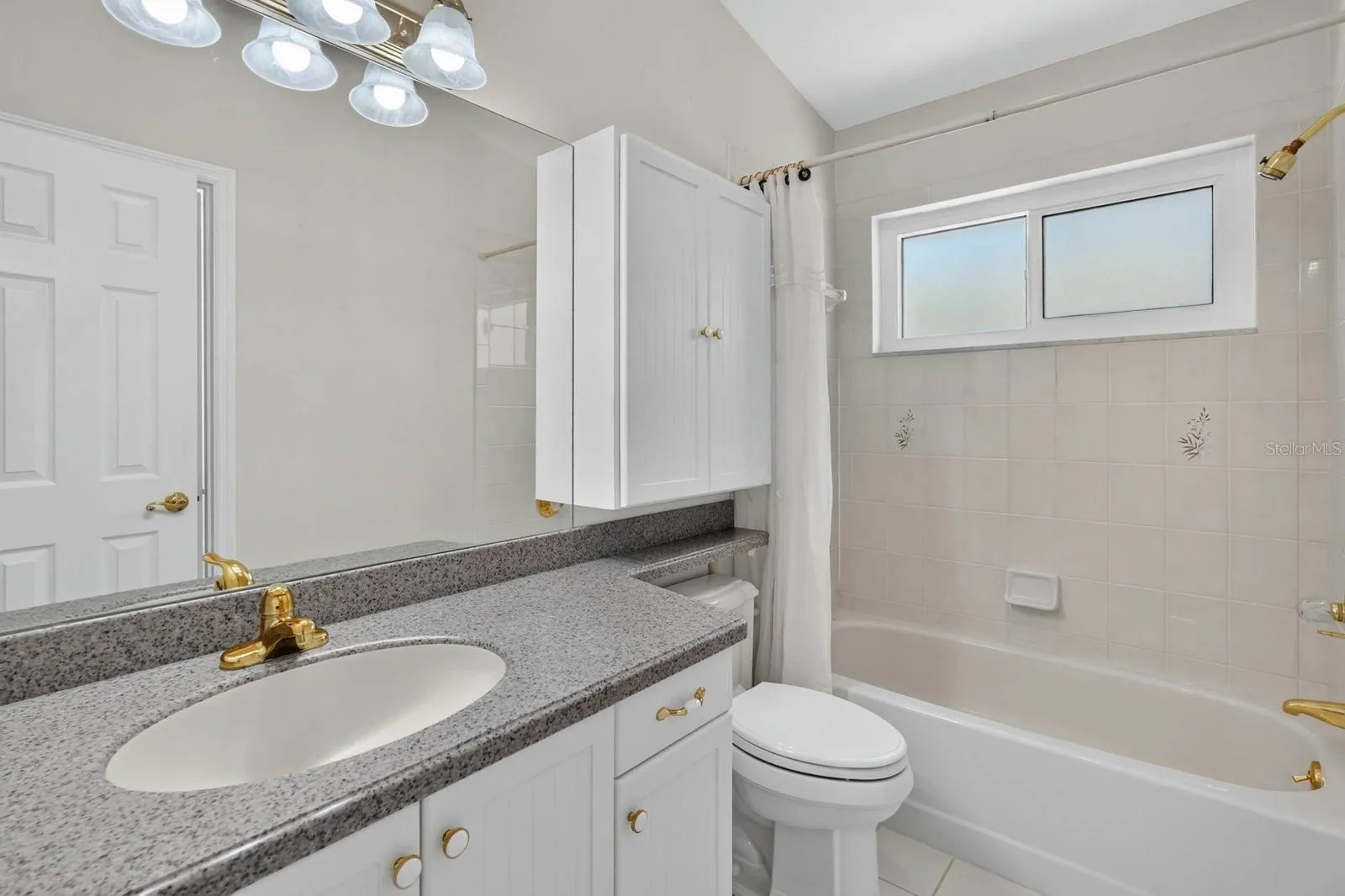 Full Bathroom With Tub Shower