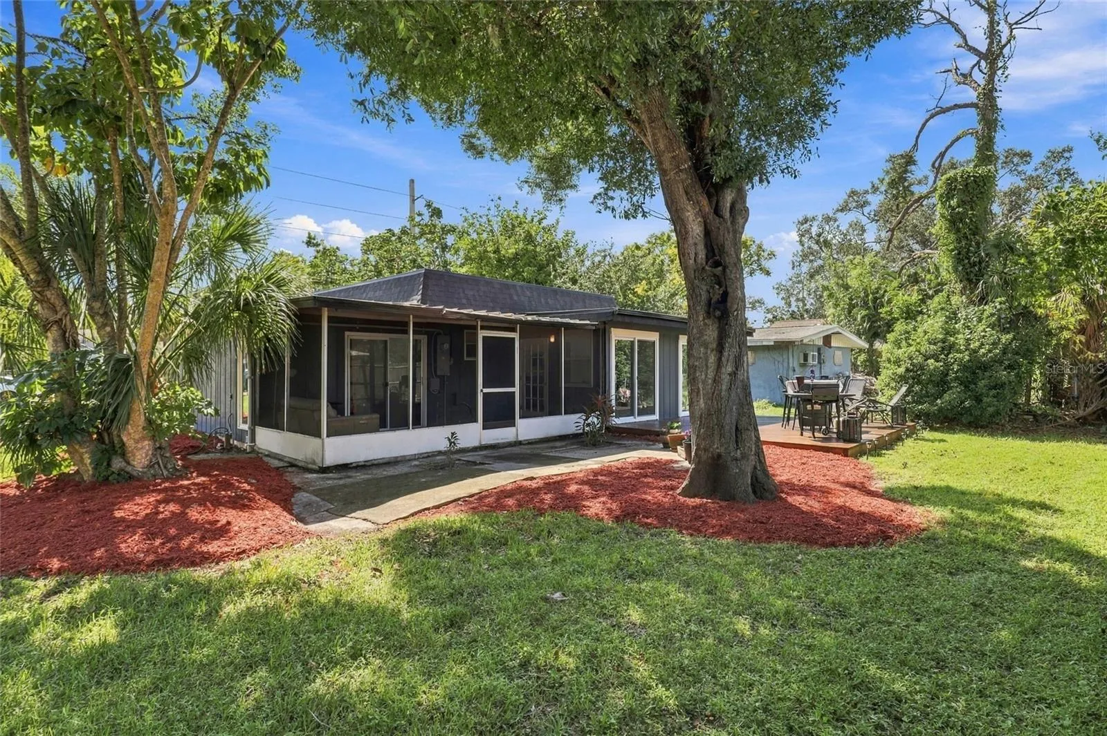 Mature Landscaping Adds Beauty, Charm, and Privacy to the Property