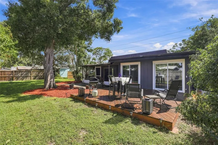 Spacious Backyard with a Charming Porch, Perfect for Relaxing and Enjoying the Outdoors