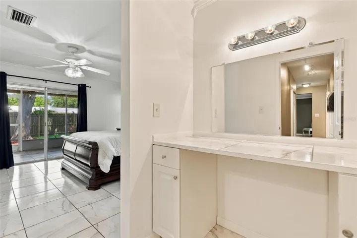 Convenient Makeup Vanity in the Primary Bedroom for Added Comfort and Functionality