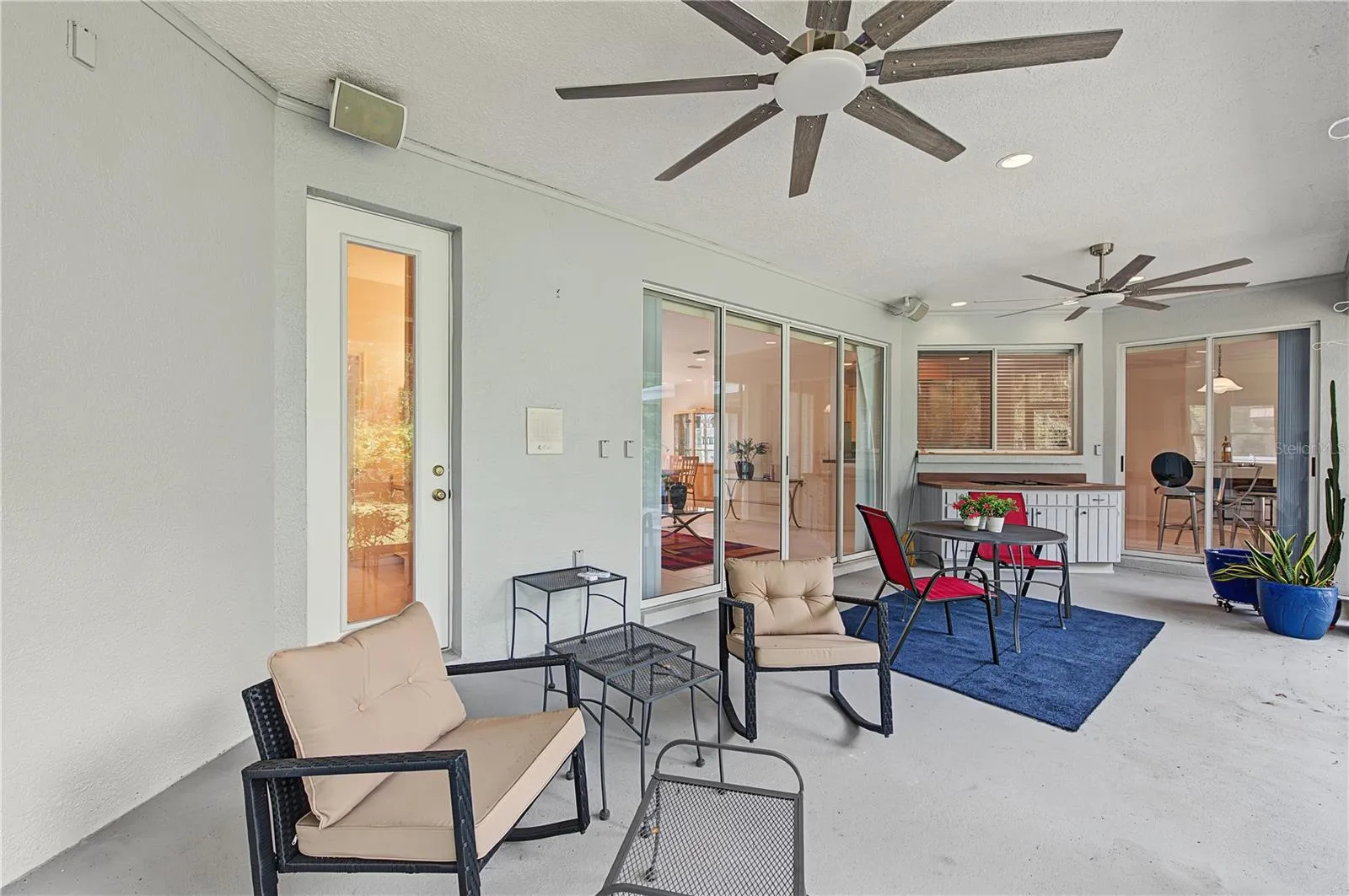 Back Porch with new ceiling fans - French doors off of the master Bedroom