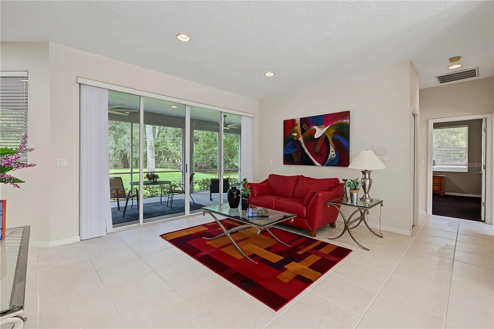 Living Room overlooking the backyard and patio