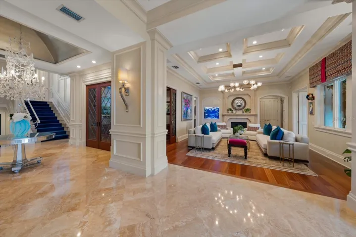 Statement chandeliers and a Built-in Saltwater Aquarium with live coral adds distinctive character!