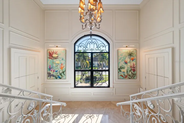 Grand, Timeless Details. Two storage closets perfectly tucked away on this landing.