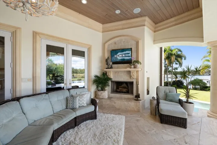 Wood clad ceiling with precast stone crown molding