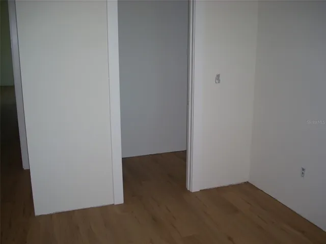 walk in closet in guest bedroom