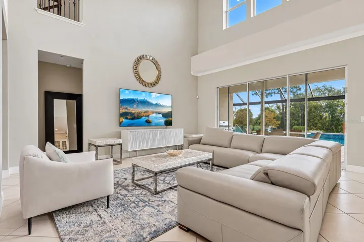 The two story living room makes a grand first impression.