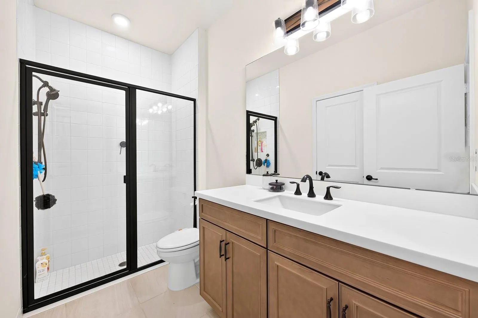 A FIRST-FLOOR BEDROOM and Full Bath provide excellent flexibility for visiting guests, extended family or multigenerational living.