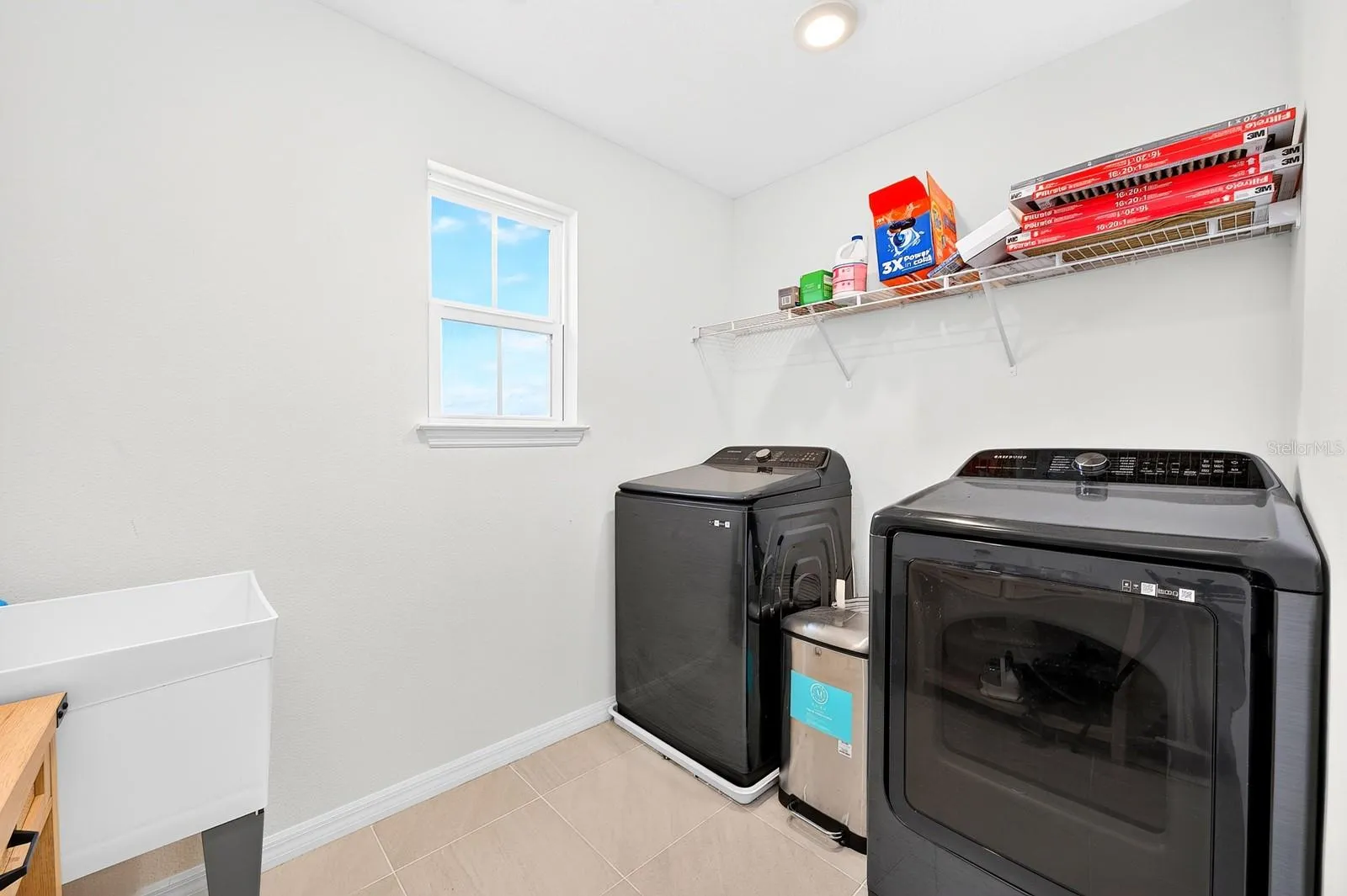 An upstairs Laundry Room with a utility sink completes the second floor.