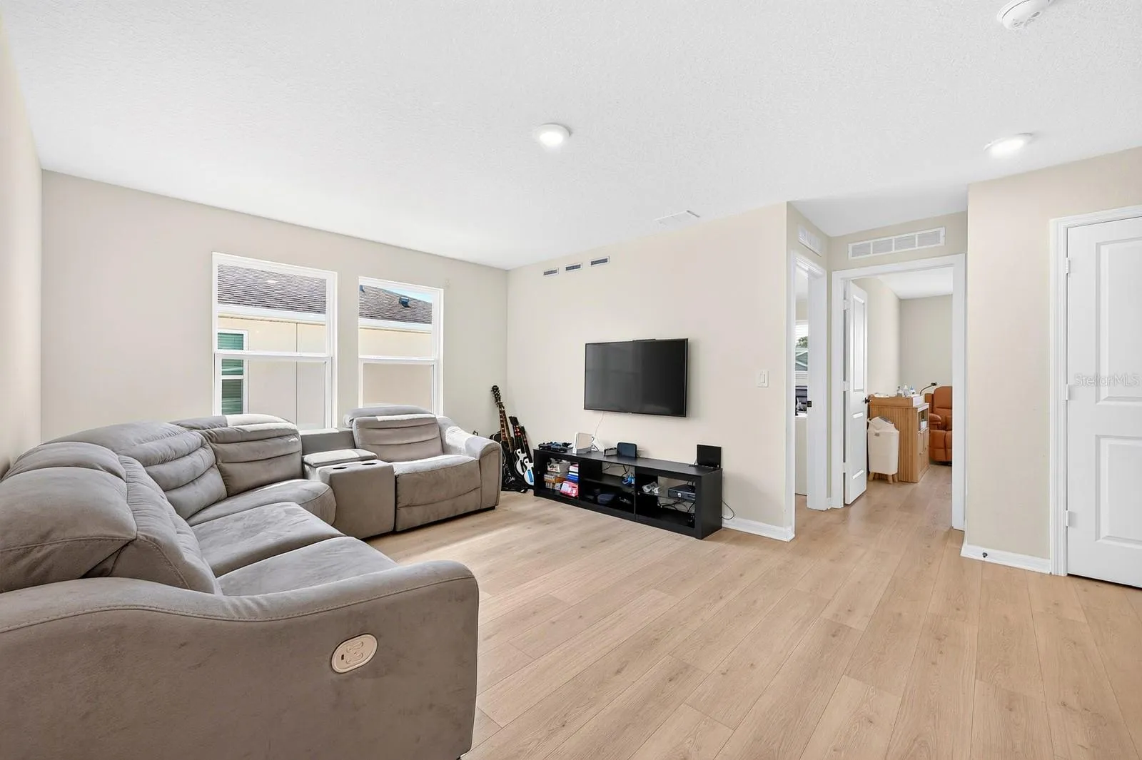 Upstairs, a SPACIOUS LOFT offers additional living space—perfect for a game room, media area or a comfortable place to gather.