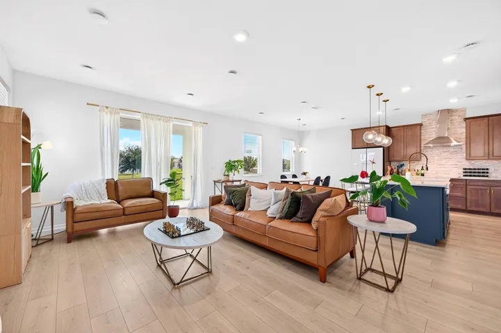 A bright, inviting interior features LUXURY VINYL PLANK FLOORING throughout.