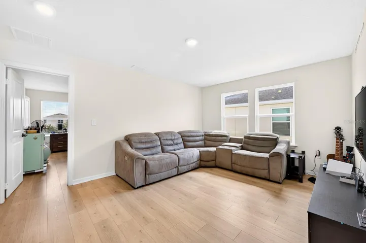 Upstairs, a SPACIOUS LOFT offers additional living space—perfect for a game room, media area or a comfortable place to gather.