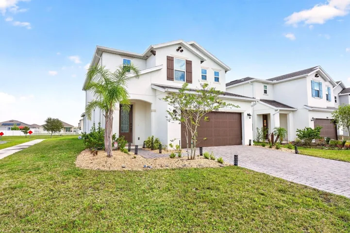 Welcome to this BEAUTIFULLY MAINTAINED 4-Bedroom, 3-Bath home in Penny Royal of Kissimmee!