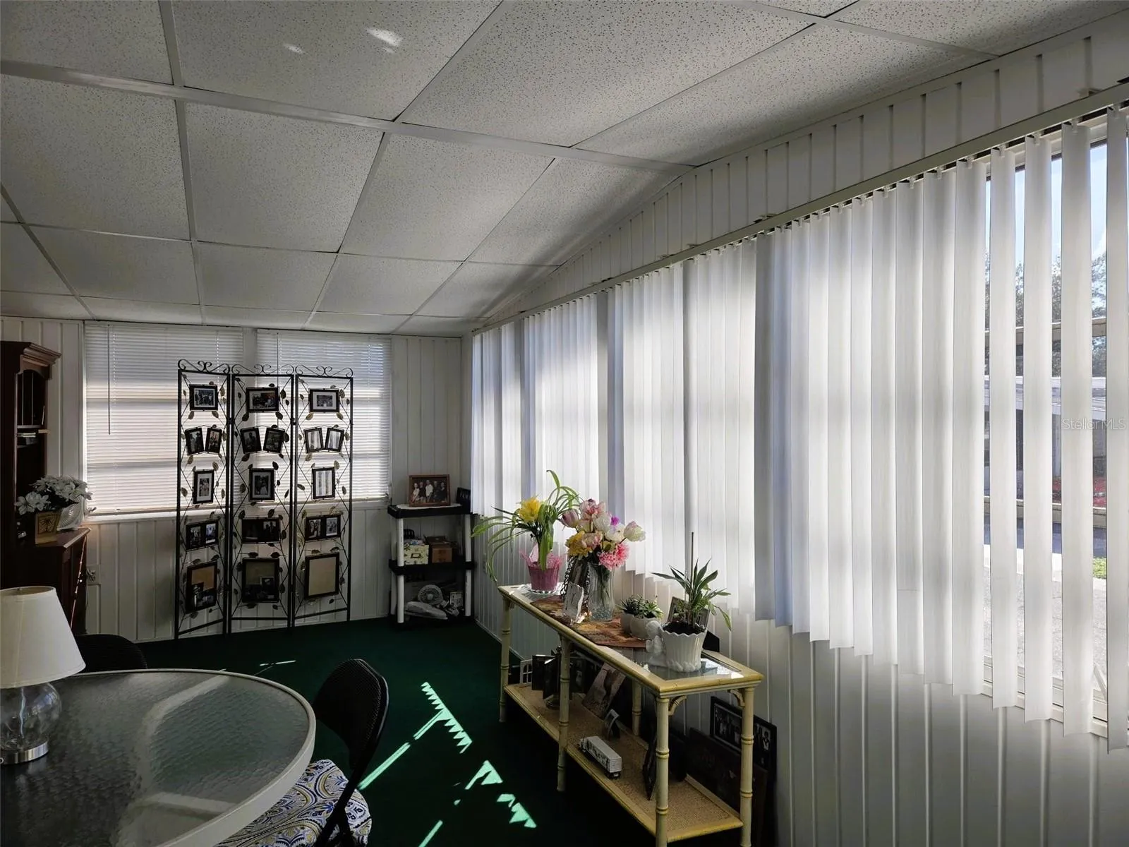 Tons of windows fully covered with blinds for privacy