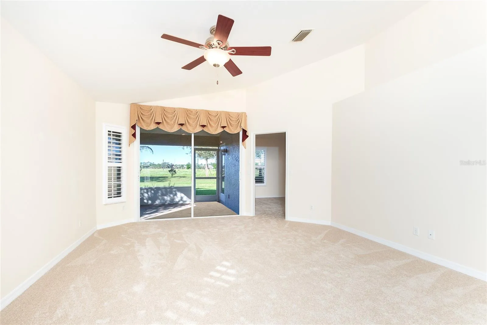 Sliders to the Lanai have Remote Control Shades