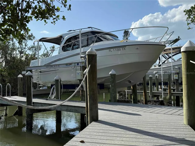 10,000 lb. capacity boat lift and dock included