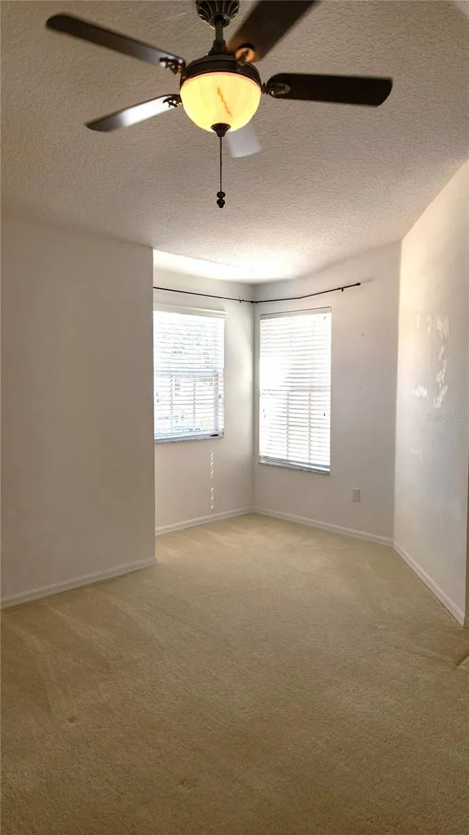 Large 2nd Bedroom facing front of home.