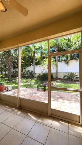 Screened rear patio.