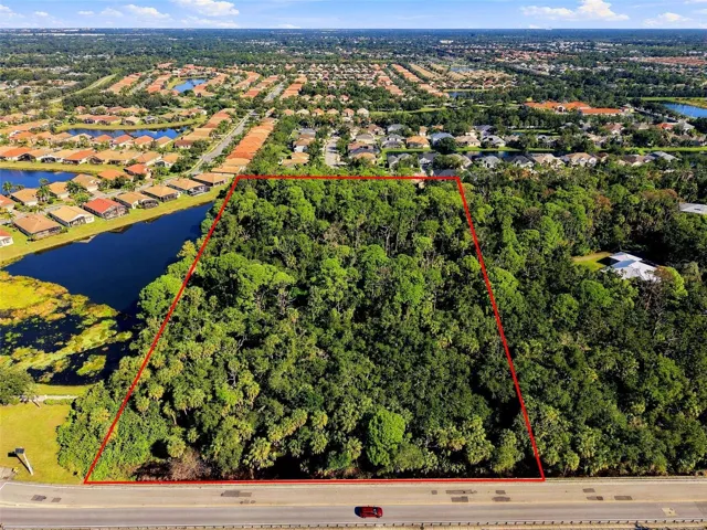 5 acre parcel centrally located.  View from South.  South boundary abuts Whitfield Ave.  Ingress is on 68th Ave E