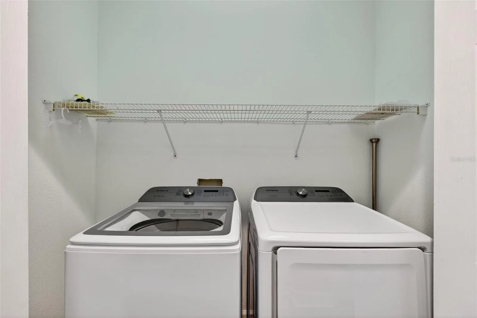 Inside Laundry on 2nd Floor with storage