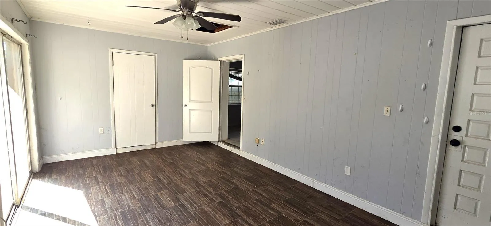 Office with separate entrance to front of house and Slider to left side of house