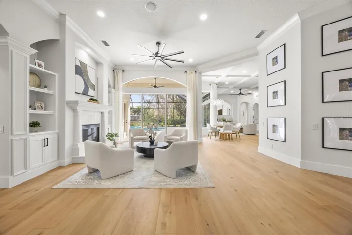 Living Room, Gas Fireplace, Built-ins and White Oak Engineered Wood Flooring