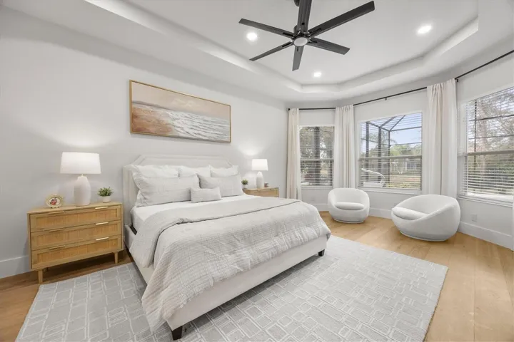 Primary Suite Bedroom and Seating Area