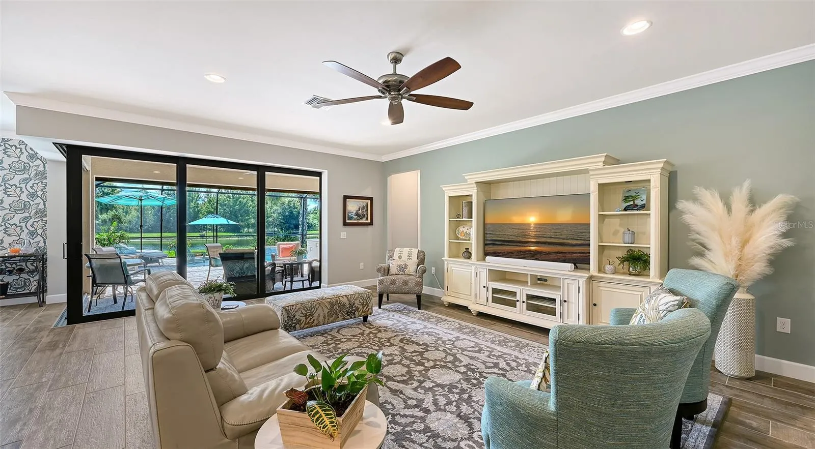 This inviting great room provides the perfect setting to unwind, relax, and enjoy the comfort of this exceptional home.