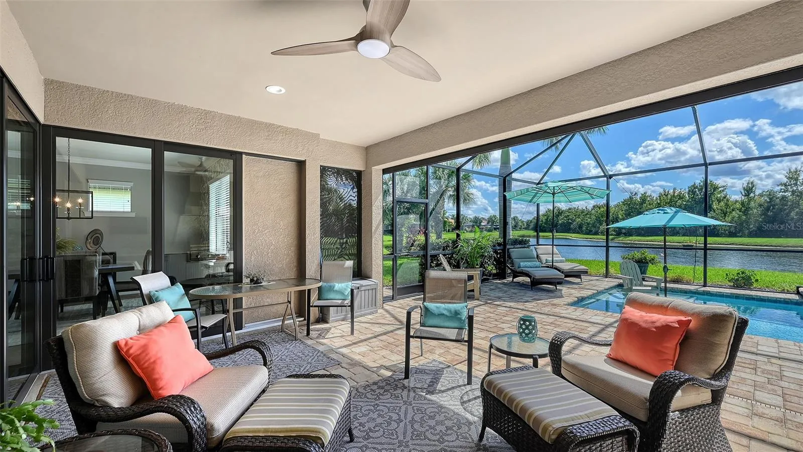 Step into your own outdoor oasis, where covered seating, a well-appointed outdoor kitchen, and breathtaking views create the perfect backdrop for Florida living.