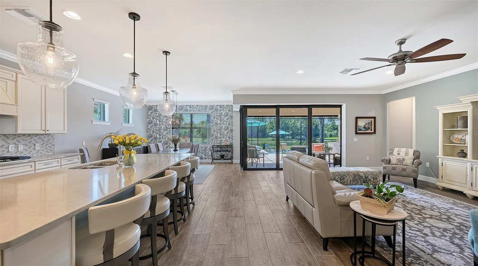 Step inside to discover an inviting great room and stunning kitchen gathering area, thoughtfully designed for everyday comfort and effortless entertaining.