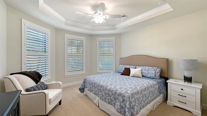 Seconday bedroom located in the front of the home featuring a large walk-in closet.